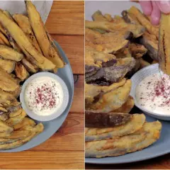 Piatto di melanzane fritte dorate e croccanti, servite con una ciotolina di salsa bianca cosparsa di spezie rosse. Una mano intinge una bastoncino di melanzana nella salsa.