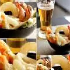 Gamberi e verdure croccanti, immersi in una leggera pastella per fritti, accompagnati da una birra bionda.