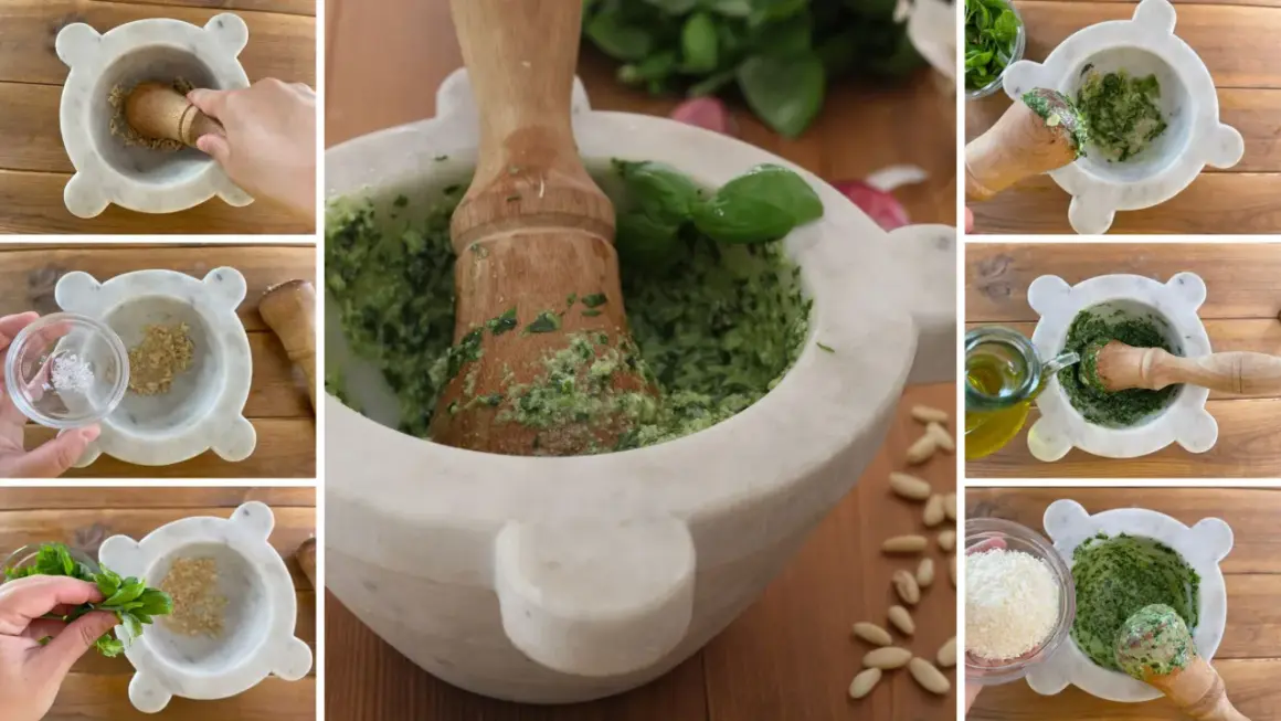 Preparazione del pesto fatto in casa: pestare aglio, sale, basilico, pinoli, parmigiano e olio d'oliva in un mortaio di marmo.